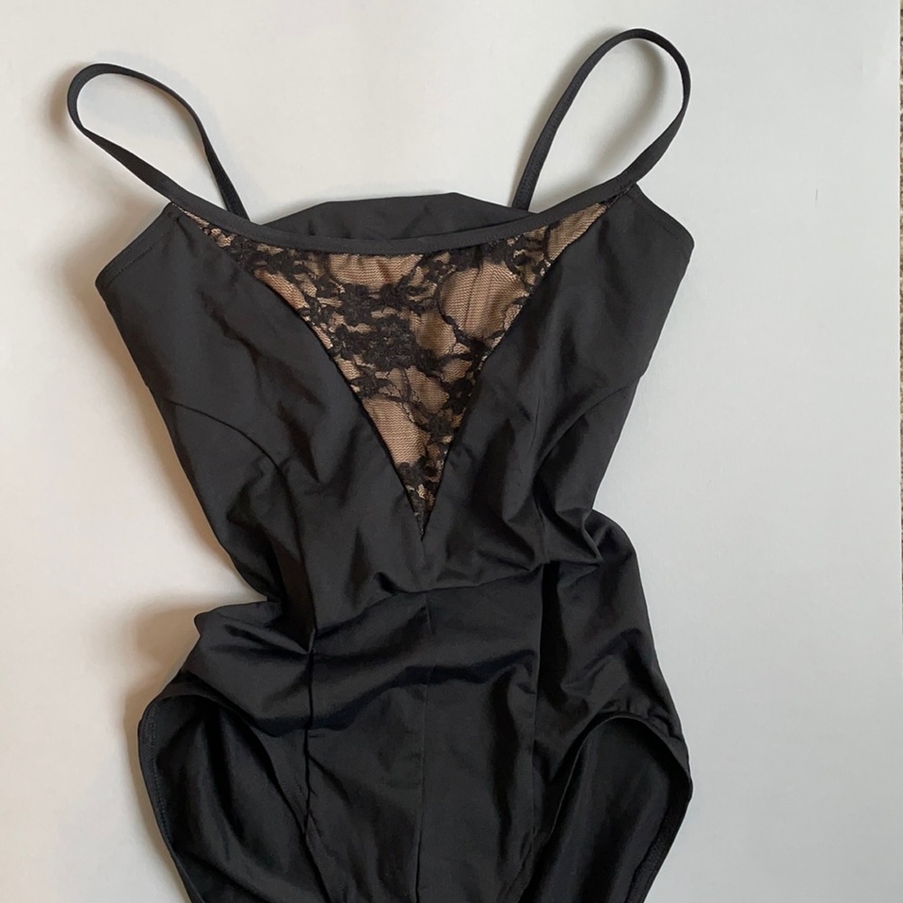 Capezio child's m black leotard with lace front